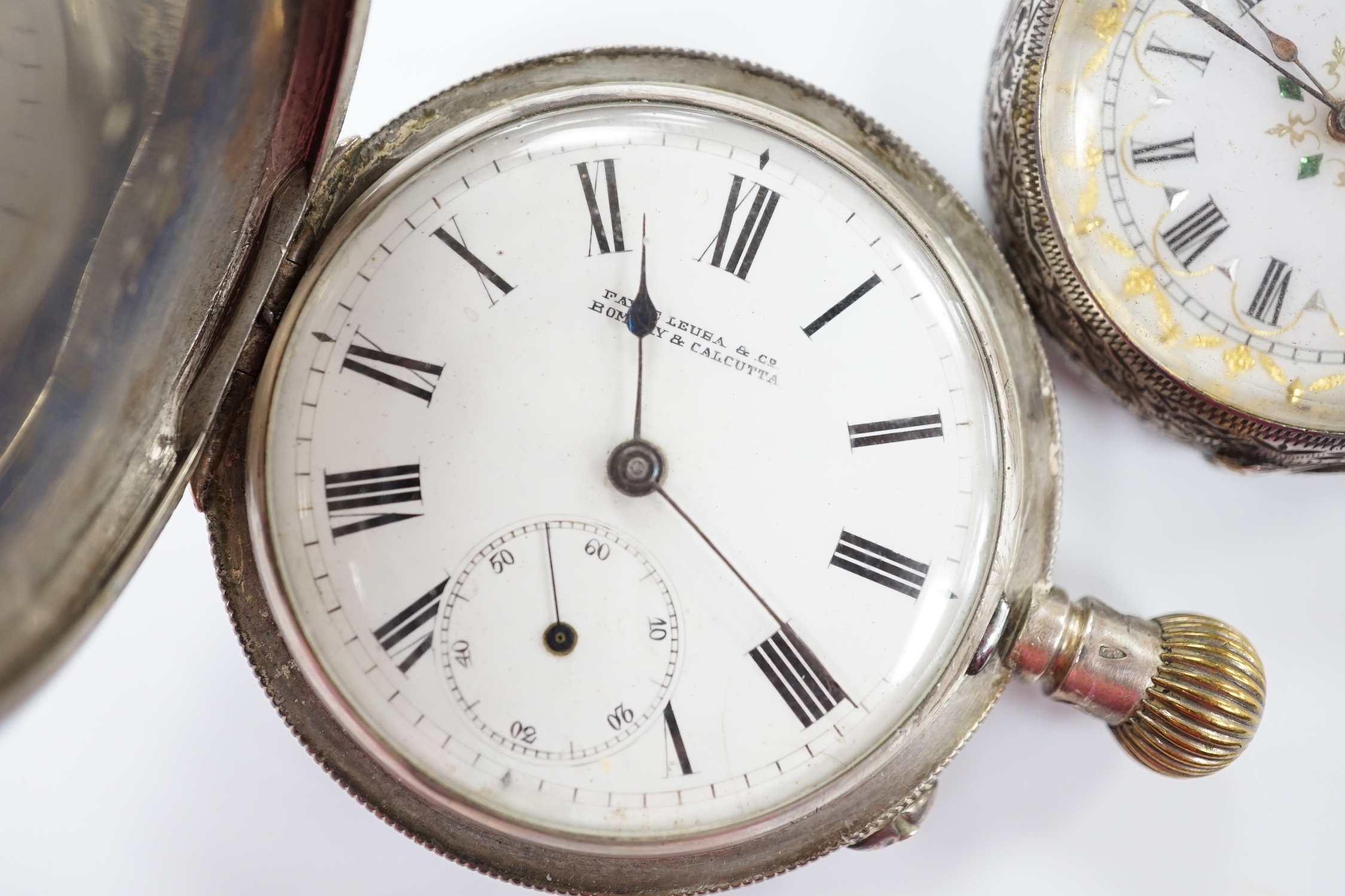 A 900 standard white metal hunter keyless pocket watch and a Swiss 933 standard white metal fob watch.